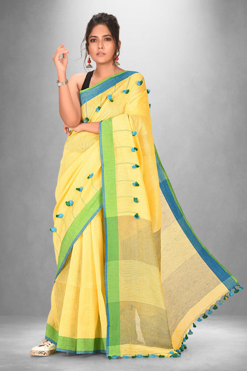 Lemon yellow Linen saree with Bright Green border