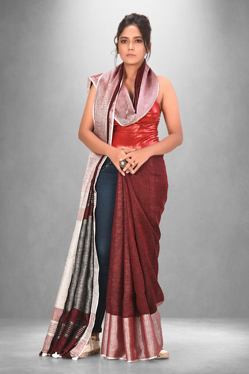 Maroon Linen saree with silver zari