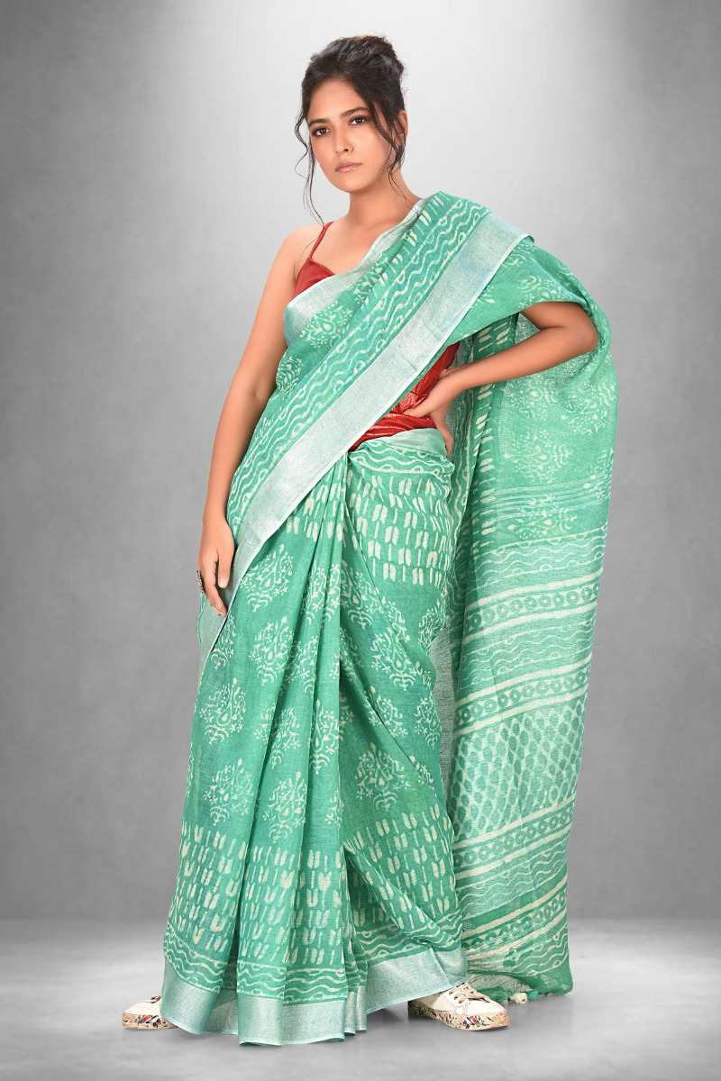 Sea Green Linen saree with Hand Dabbu Print
